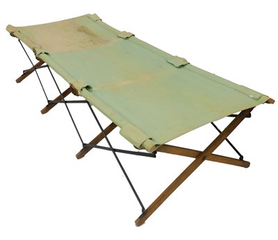 Lot 520 - An oak framed folding camp bed, possibly First...