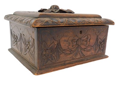 Lot 537 - A Continental fruitwood carved box, the lid...