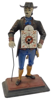 Lot 544 - A cast iron pedler clock, the face bearing...