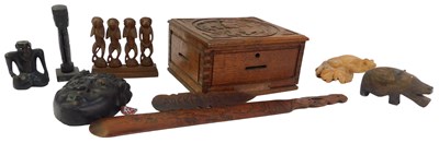 Lot 552 - A group of wooden carved items, to include an...