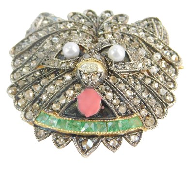 Lot 24 - An Eastern inspired brooch, formed as a dog's...