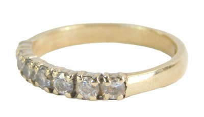 Lot 229 - A 9ct gold half hoop dress ring, set with...