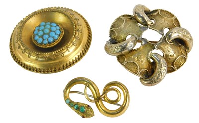 Lot 234 - Three Victorian brooches, comprising a...