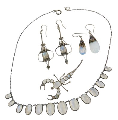 Lot 237 - A group of imitation moonstone set...