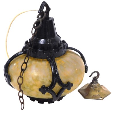 Lot 856 - A mid-century glass and cast iron bound...
