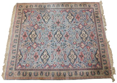 Lot 579 - A Persian-style carpet, pale blue ground with...