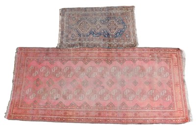 Lot 580 - A Turkman Bokhara rug, red ground with two...