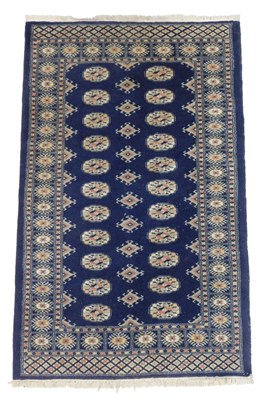 Lot 578 - A Bokhara rug, blue ground with two rows of...