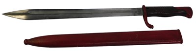 Lot 622 - A WWI German bayonet, with a wooden handle,...