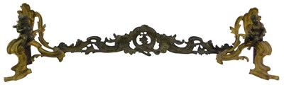 Lot 624 - A 19thC brass chenet, with cherub embellished...