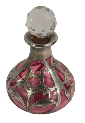 Lot 62 - An early 20th C cranberry glass and silver...