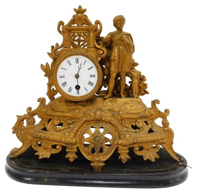Lot 105 - A late 19thC French gilt metal mantel clock,...
