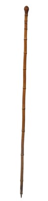 Lot 627 - A late 19thC bamboo walking cane, with a burr...