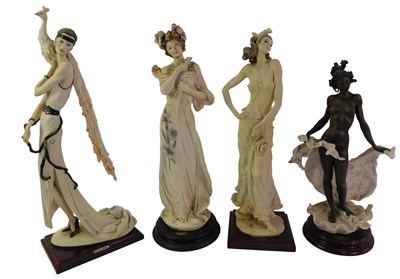 Lot 566 - Four Giuseppe Armani figures, each depicting a...