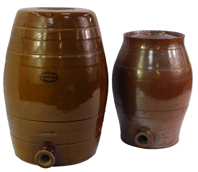 Lot 589 - A stoneware treacle-glazed spirit barrel,...