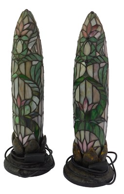 Lot 592 - A pair of lead glass table lamps, of...