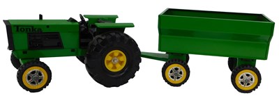 Lot 597 - A Tonka 2710 tractor and trailer, in blue, boxed.