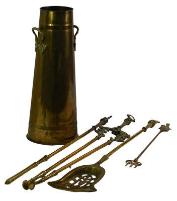 Lot 603 - Three brass fireside implements, comprising...