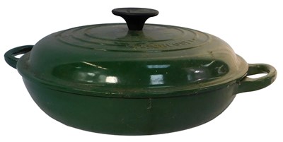 Lot 611 - A Le Creuset green cast iron shallow...