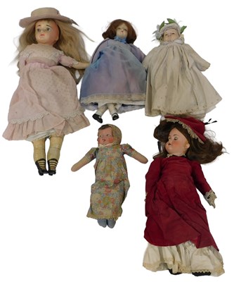 Lot 613 - A group of dolls, including 20thC bisque head...