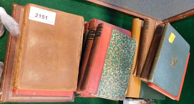 Lot 2151 - A small group of books, including Dickens,...