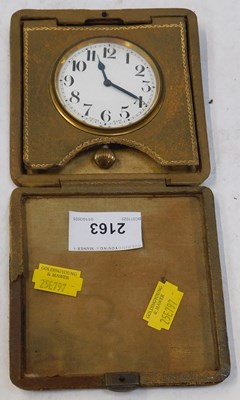 Lot 2163 - A travelling clock, in case.