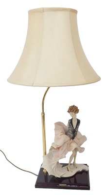 Lot 116a - A Capodimonte Guiseppe Armani resin figural...