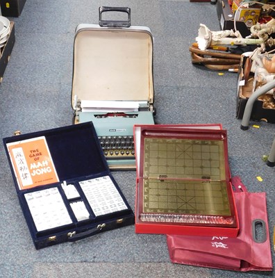 Lot 2124a - An Olivetti portable typewriter, together with...