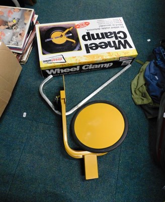Lot 2048 - A Streetwize accessories car wheel clamp, boxed.