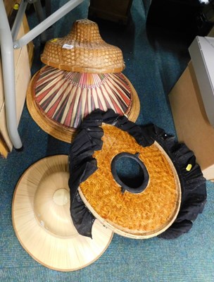Lot 2093 - A collection of oriental straw hats. (6)
