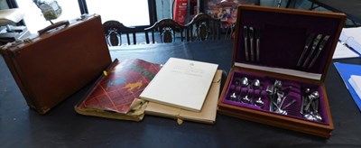 Lot 2175 - A part canteen of cutlery, scrapbook, suitcase,...