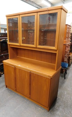 Lot 1522 - An oak living room cabinet, three glazed doors...