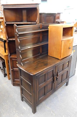 Lot 1531 - A collection of dark oak furniture, to include...