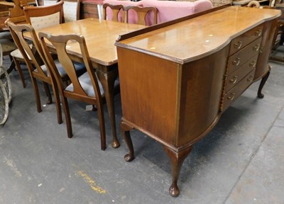 Lot 1537 - An extending dining table, on cabriole legs...