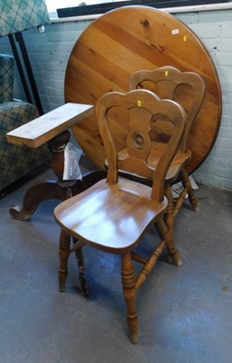 Lot 1554 - A circular pine breakfast table, on tripod...