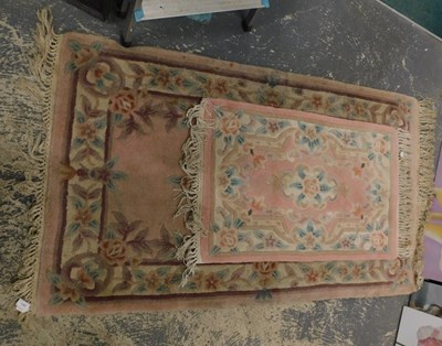 Lot 1571 - Two modern machine woven Chinese rugs, floral...