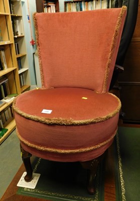 Lot 1588 - A small round pink bedroom chair, with...