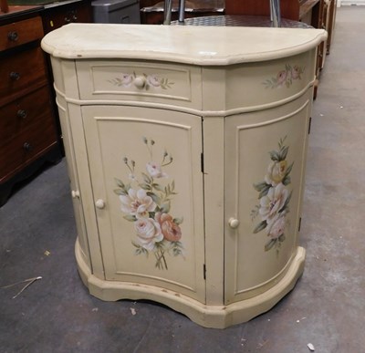 Lot 1602 - A serpentine fronted cream painted bathroom...