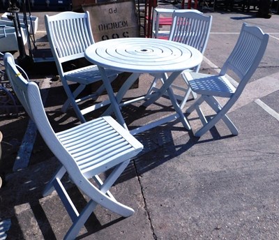 Lot 1654 - A white painted folding circular wooden garden...