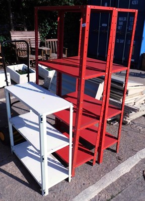 Lot 1657 - A red metal outdoor or garage shelving unit,...