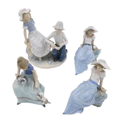 Lot 471 - Four Nao figure groups, comprising girl with...