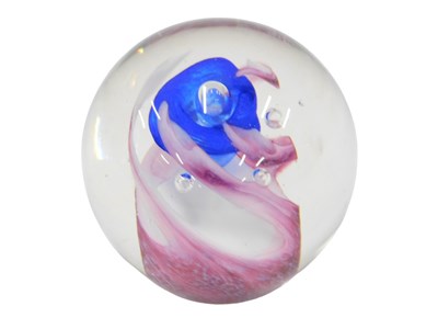 Lot 483 - A floral glass paperweight, possibly...