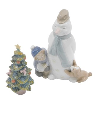 Lot 484 - A Lladro Christmas tree, 14cm high, and a Nao...