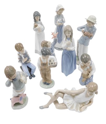 Lot 499 - A collection of Nao figures, to include...