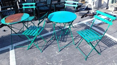 Lot 1663 - A set of four folding green metal garden...