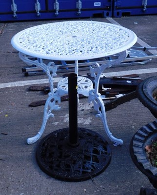 Lot 1669 - A circular painted aluminium garden table,...