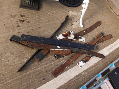 Lot 1670 - A quantity of wrought iron gate hinges.