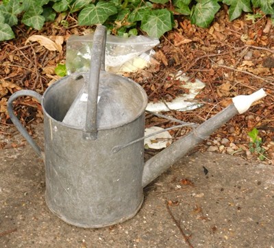 Lot 1676 - A galvanised one gallon watering can.