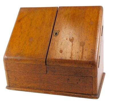 Lot 453 - A late 19th/early 20thC oak stationery box,...