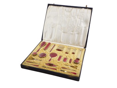 Lot 551 - A brass and enamel travel set, the enclosed...